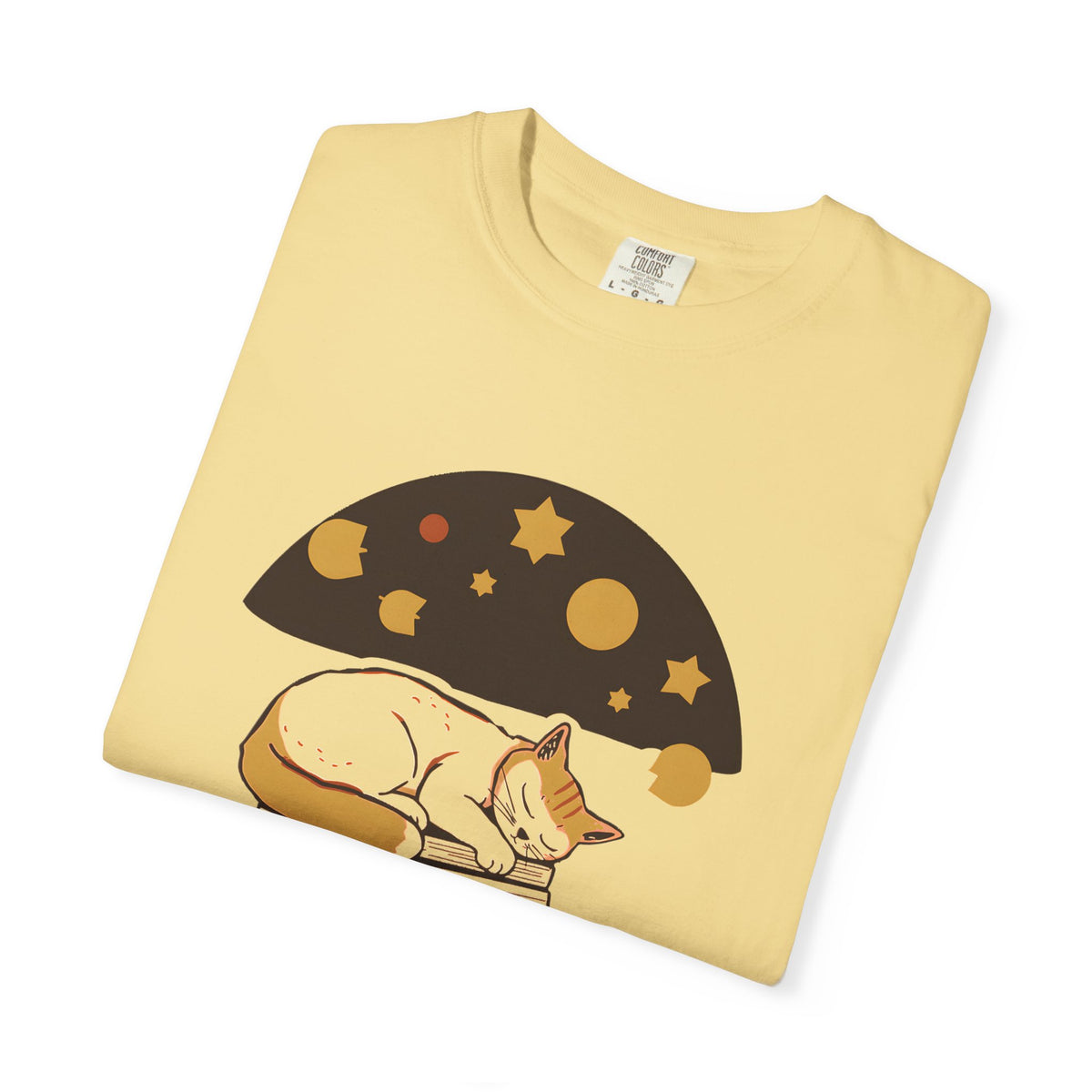 Lunch Break Read tee in Butter yellow, folded — close view of the sleeping cat and books print