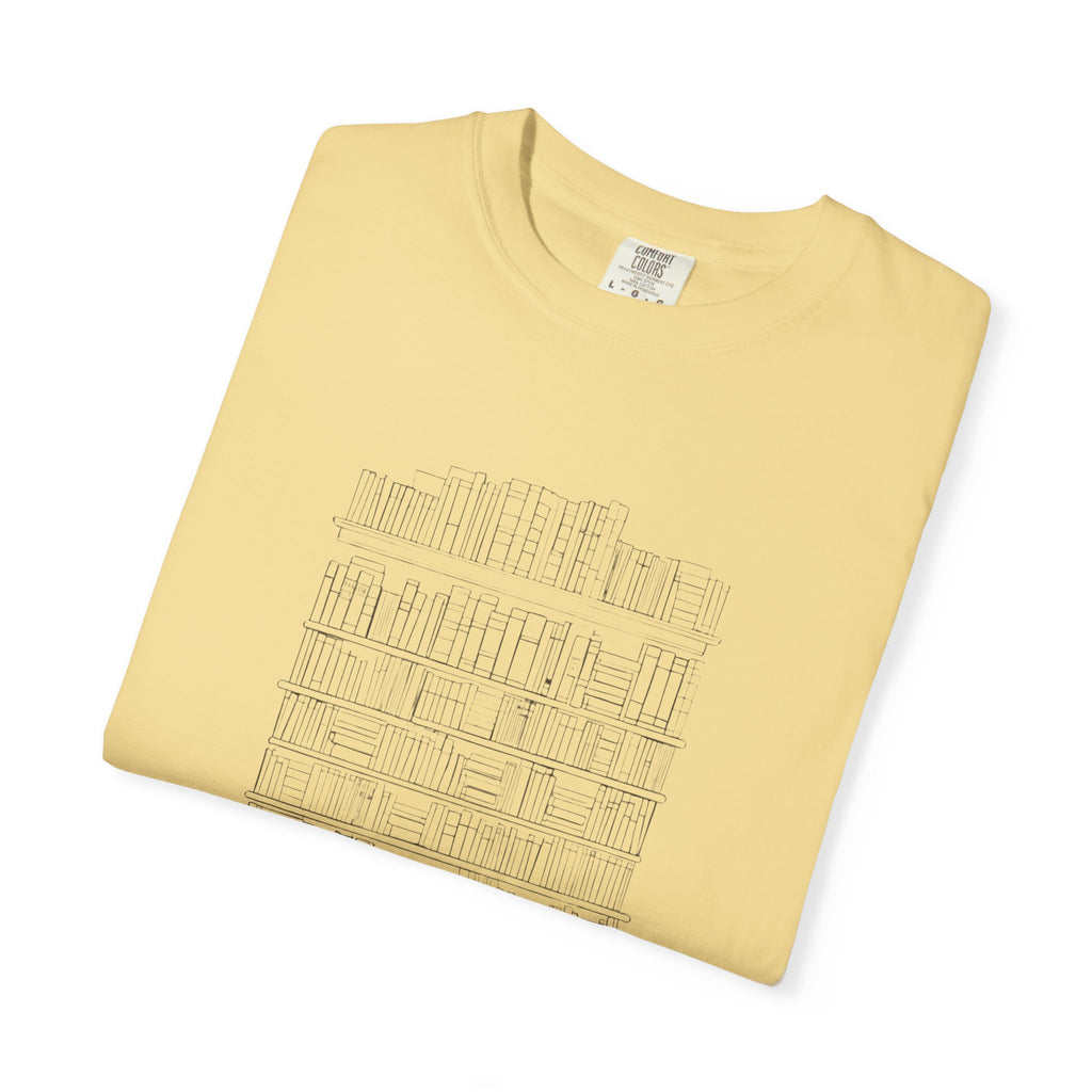 So Many Books So Little Shelf Space tee in Butter yellow, folded — close view of the bookshelf print