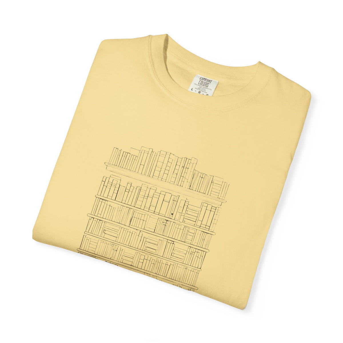 So Many Books So Little Shelf Space tee in Butter yellow, folded — close view of the bookshelf print