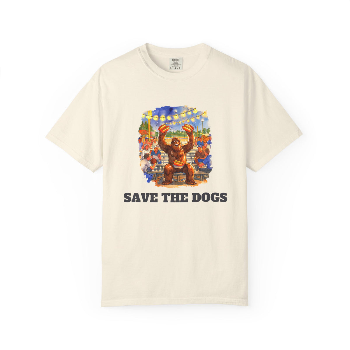 Save The Dogs funny baseball tee - Otis the sasquatch holding his hot dogs high at a night ballgame, Comfort Colors unisex tee