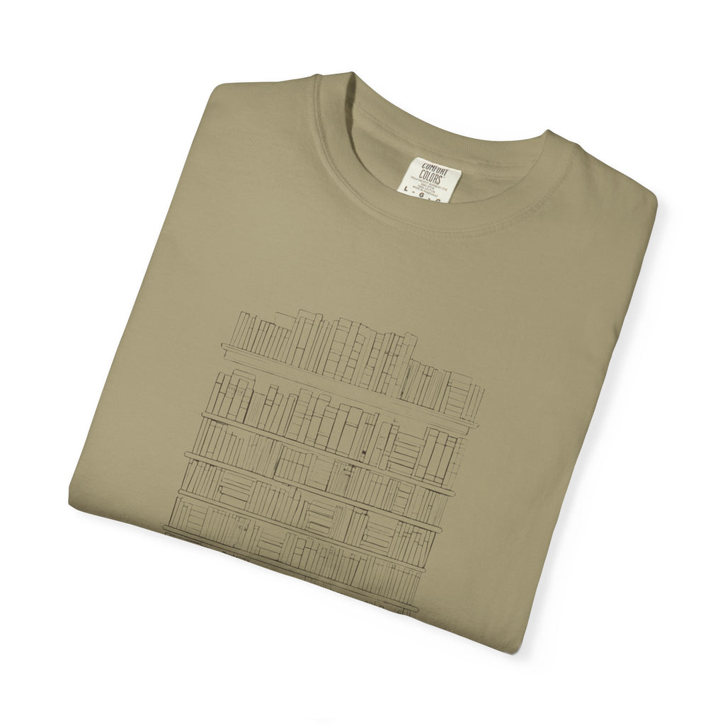 So Many Books So Little Shelf Space tee in Khaki, folded — close view of the bookshelf print
