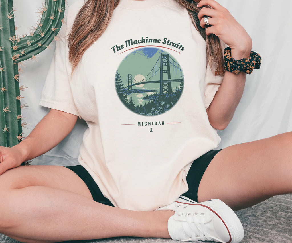 Mackinac Straits Shirt - Michigan Souvenir Tee: ivory Comfort Colors tee worn by a model [worn lead]